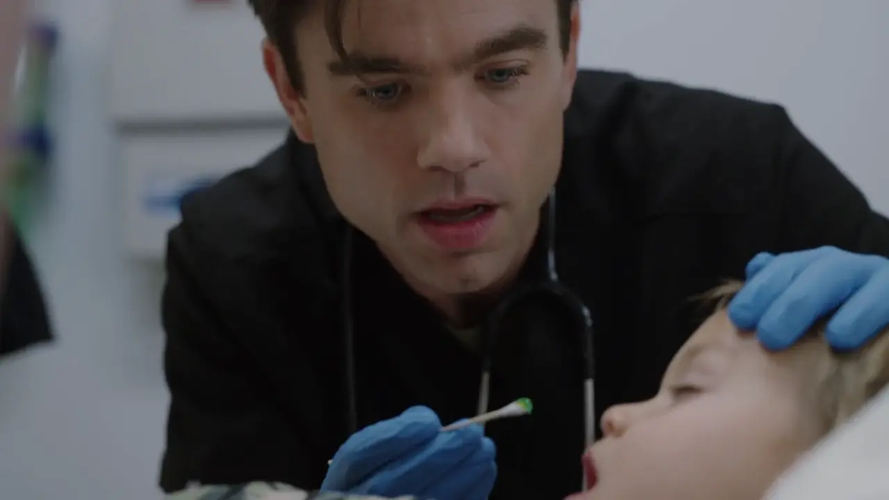 Doctor finding THC gummy debris between the patient's teeth.